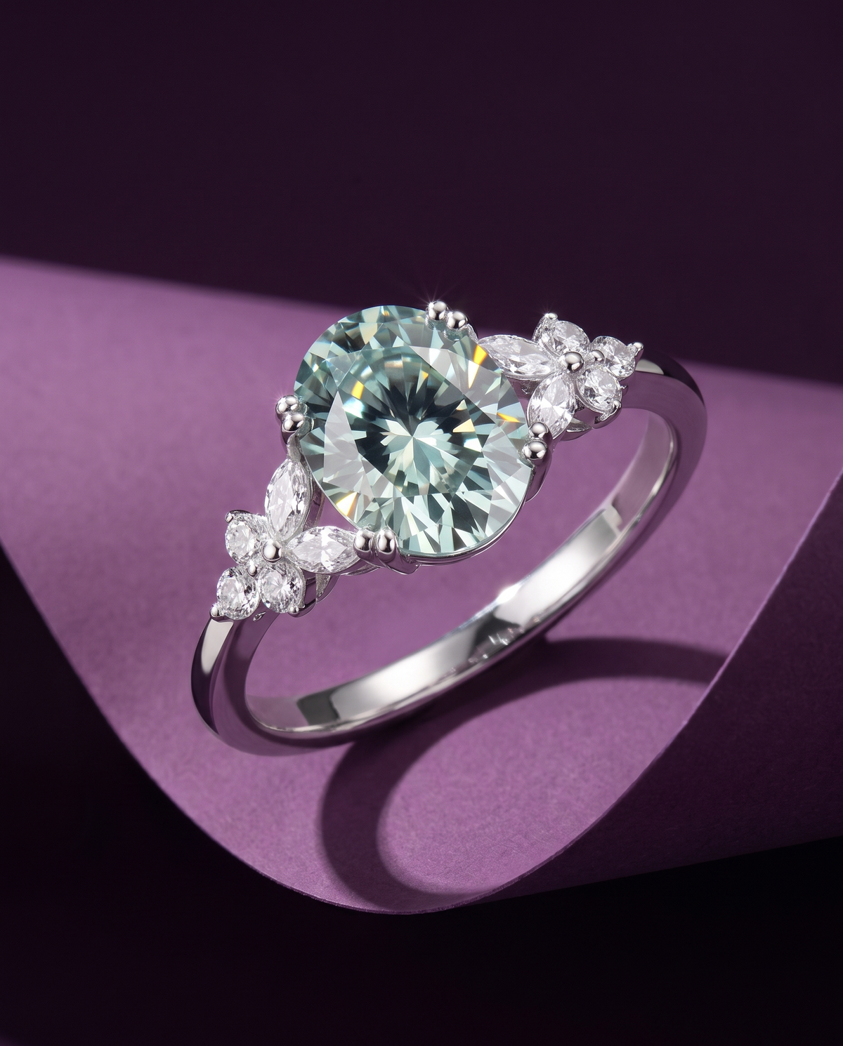 Blue-green oval cluster ring, sterling silver