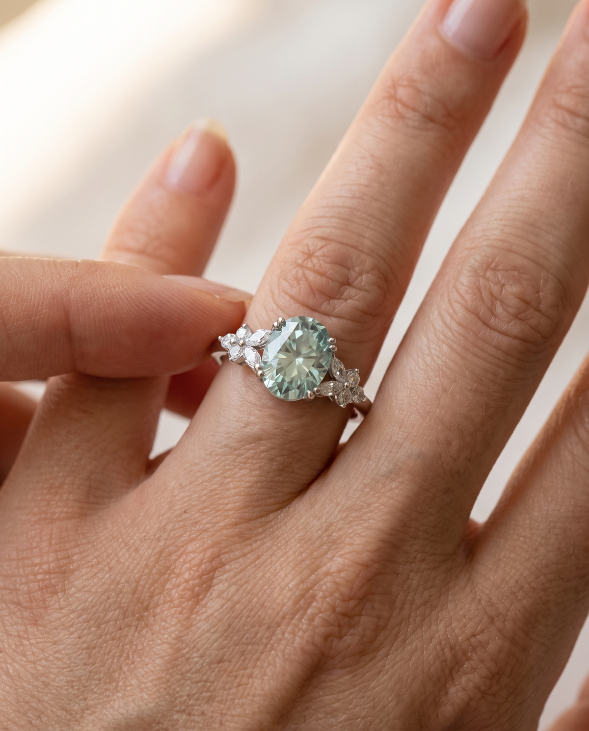 Blue-green oval cluster ring, sterling silver