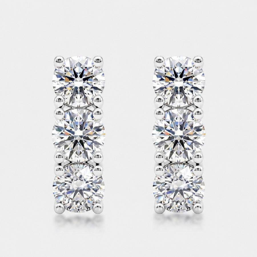 Three-stone line studs, sterling silver
