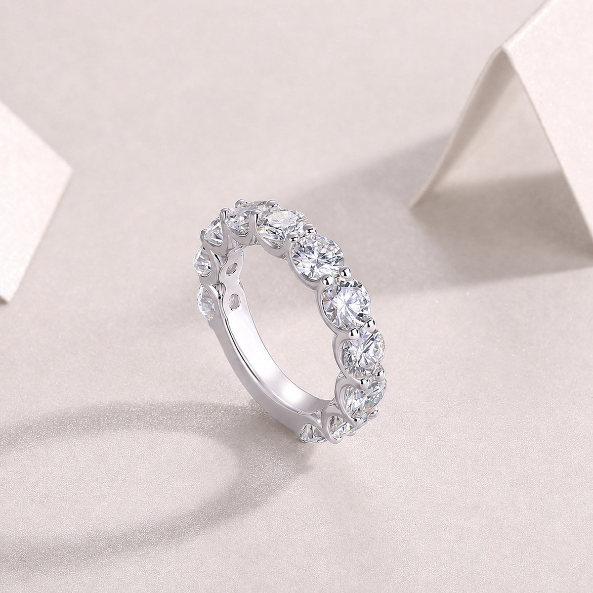 Shared-prong band, sterling silver